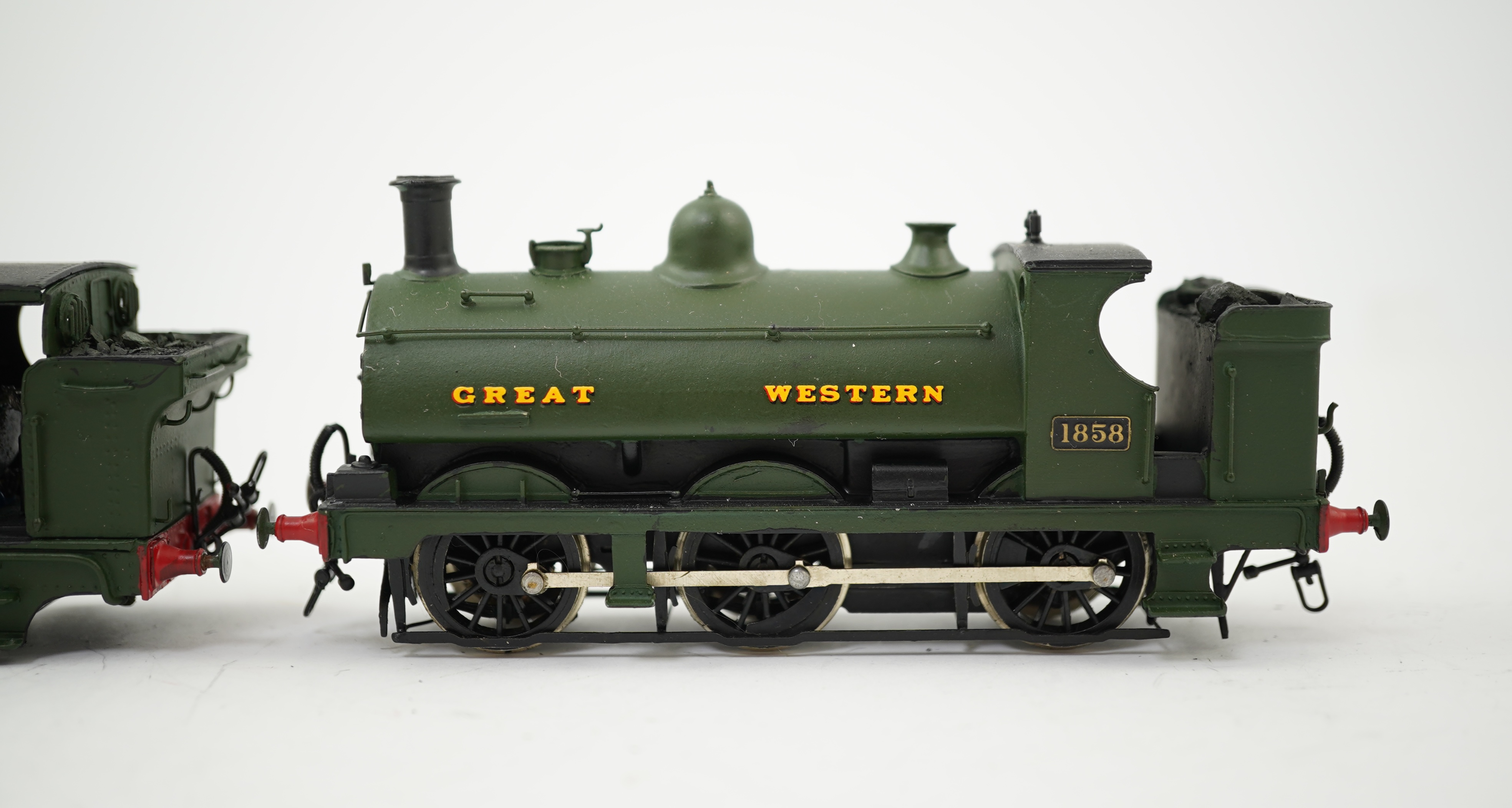 Two 00 gauge brass and white metal kit built GWR tank locomotives; a 2021 class 0-6-0PT, 2032, together with an 1854 class 0-6-0ST, 1858, constructed, painted and lined to a high standard, both motored for two rail opera